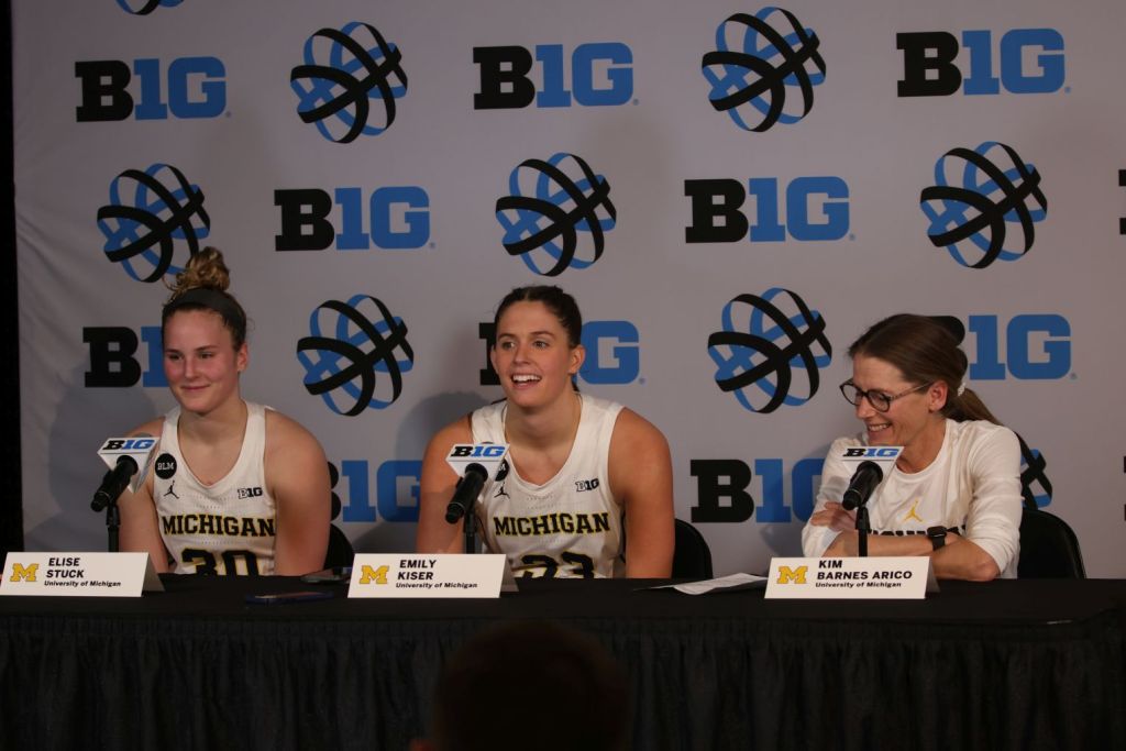 Michigan players Elise Stuck and Emily Kiser, along with head coach Kim Barnes Arico, speak to the media after the Wolverines defeated Penn State in the Big Ten Conference Tournament on Mar. 2, 2023. (John McLellan photo)
