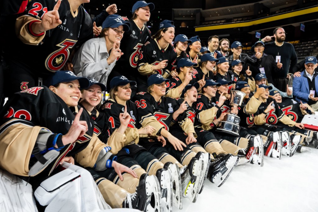 Members of the Toronto Six are pictured after clinching their first-ever Isobel Cup. (Photo Credit / Lori Bolliger)