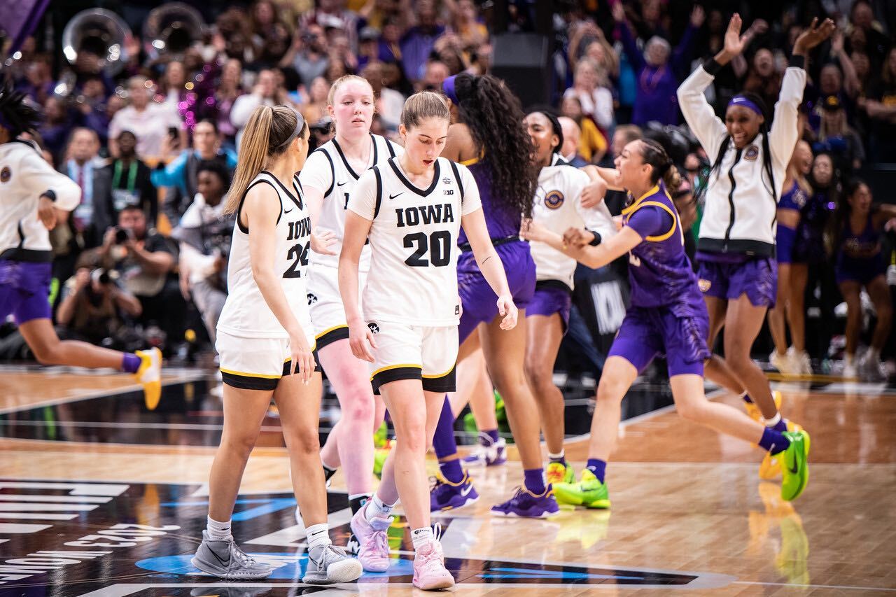 Kate Martin, Gabbie Marshall and Addison O'Grady walk back to the bench after the final buzzer as LSU wins the 2023 national championship on April 2, 2023.