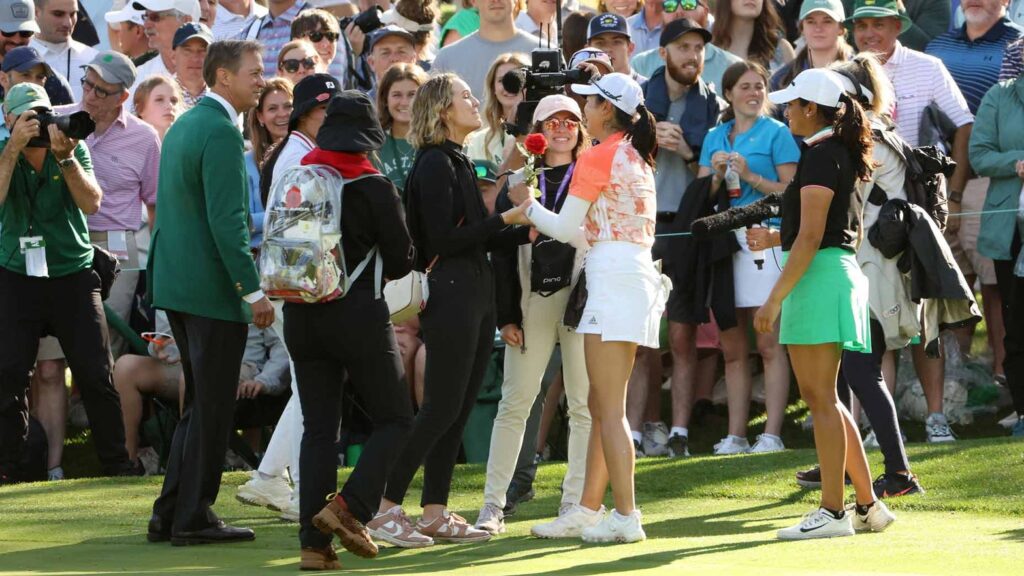Rose Zhang is embraced by her teammates after winning the Augusta National Women's Amateur from Getty Images.