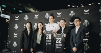Breanna Stewart and Courtney Vandersloot pose with their new Liberty jerseys. Photo Credit: New York Liberty