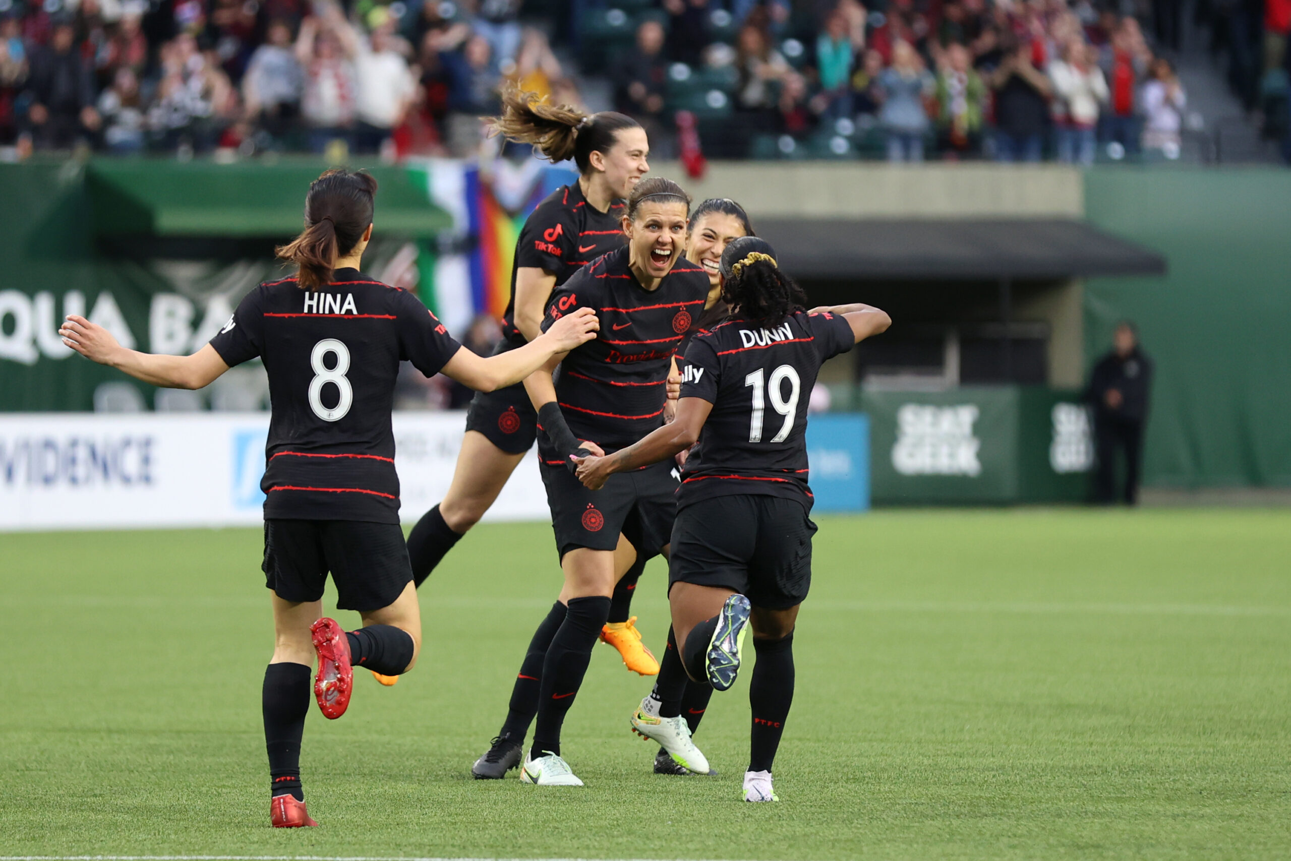 Apr 22, 2023; Portland, Oregon, USA; Portland Thorns FC forward Christine Sinclair (12) celebrates with teammates after scoring a goal during the first half against Racing Louisville FC at Providence Park. Craig Mitchelldyer-USA TODAY Sports