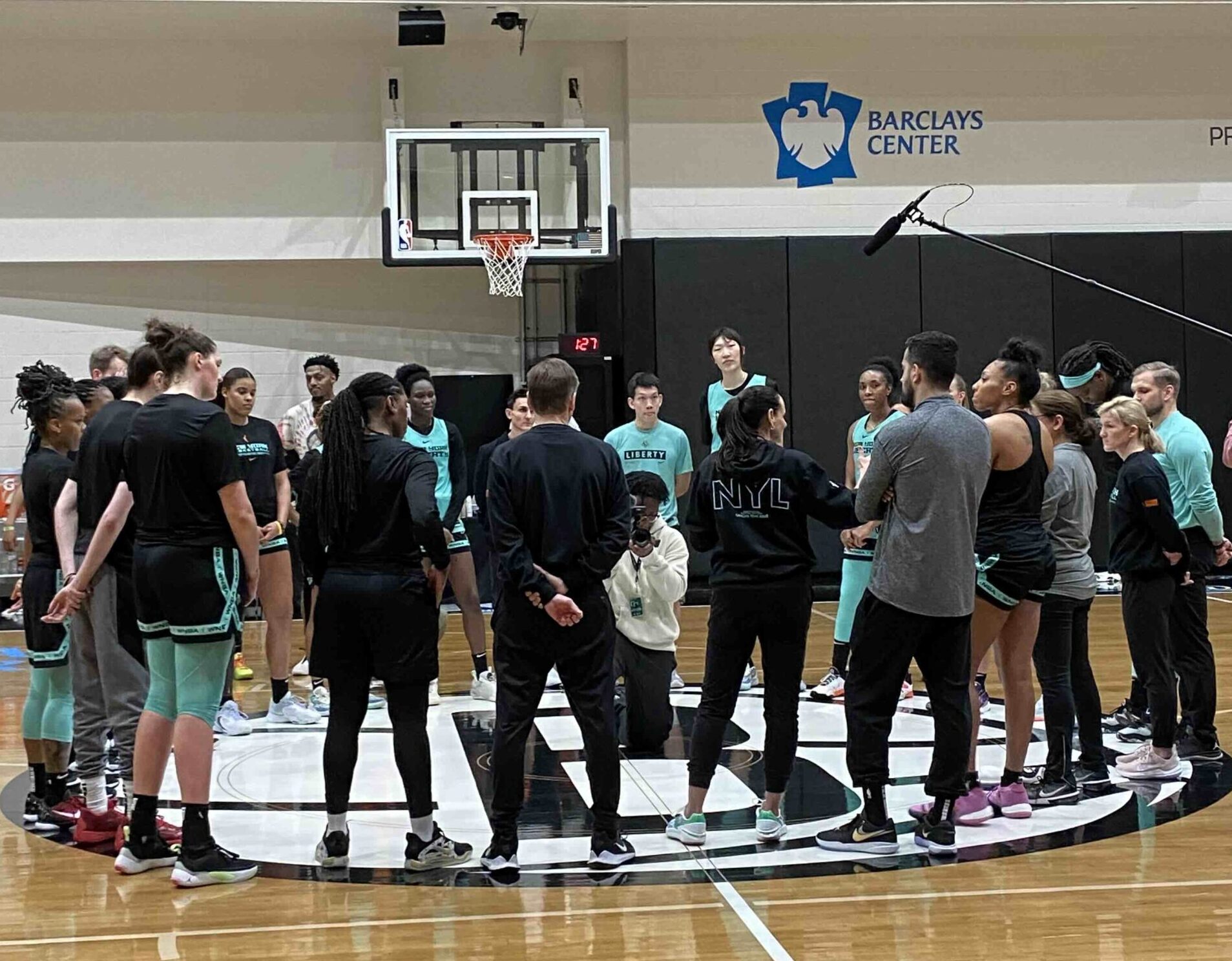 The New York Liberty gather in the circle following the conclusion of their training camp practice on Thursday May 4. Photo Credit: Jackie Powell