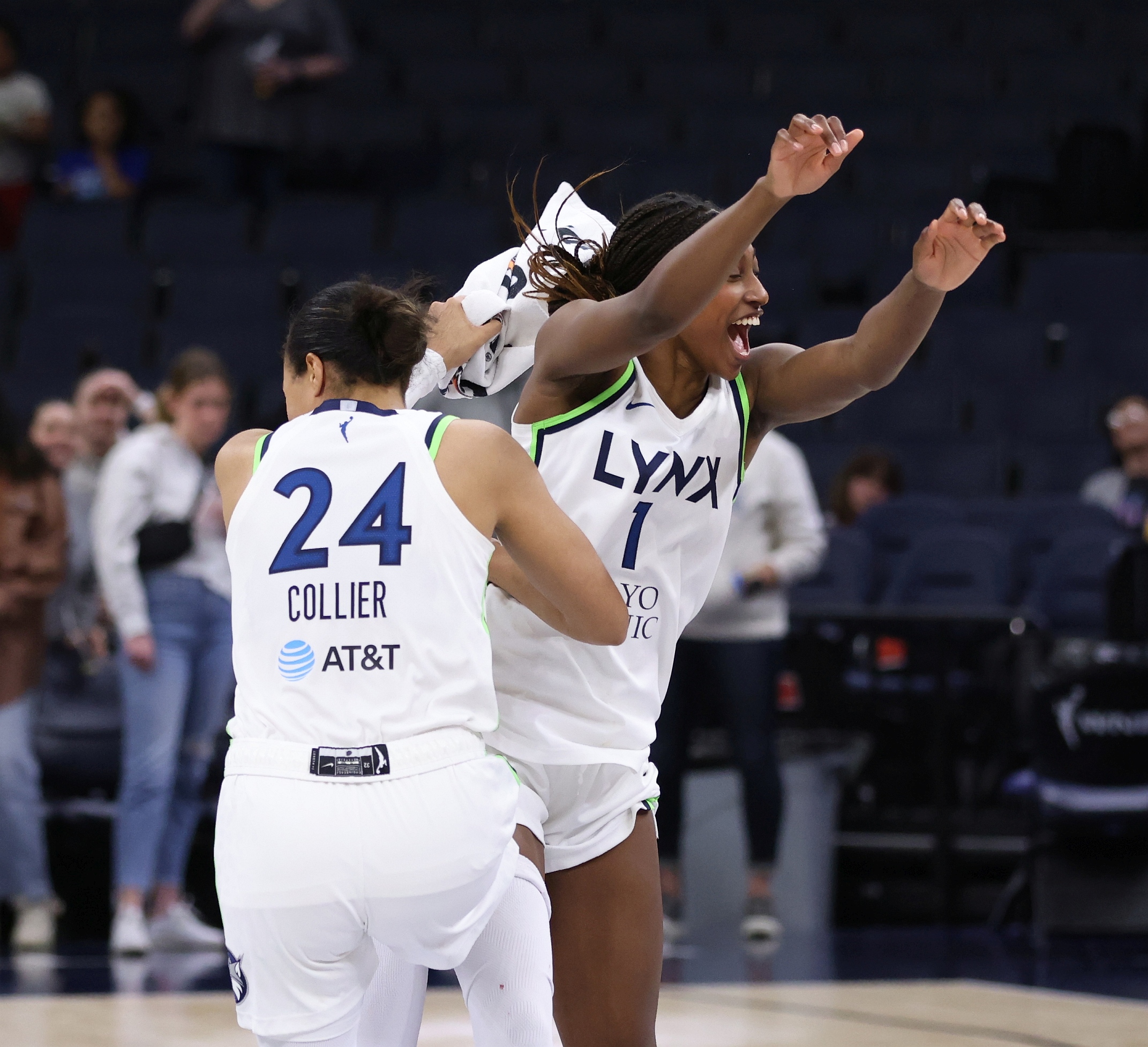 Lynx rookie Diamond Miller and team captain Napheesa Collier celebrate after defeating the Washington Mystics 72-69 in a preseason game on Friday, May 5 at Target Center in Minneapolis (Photo Credit: John McClellan)