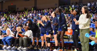 The Dallas Wings bench celebrates during a game against the Atlanta Dream. (photo via Dallas Wings)