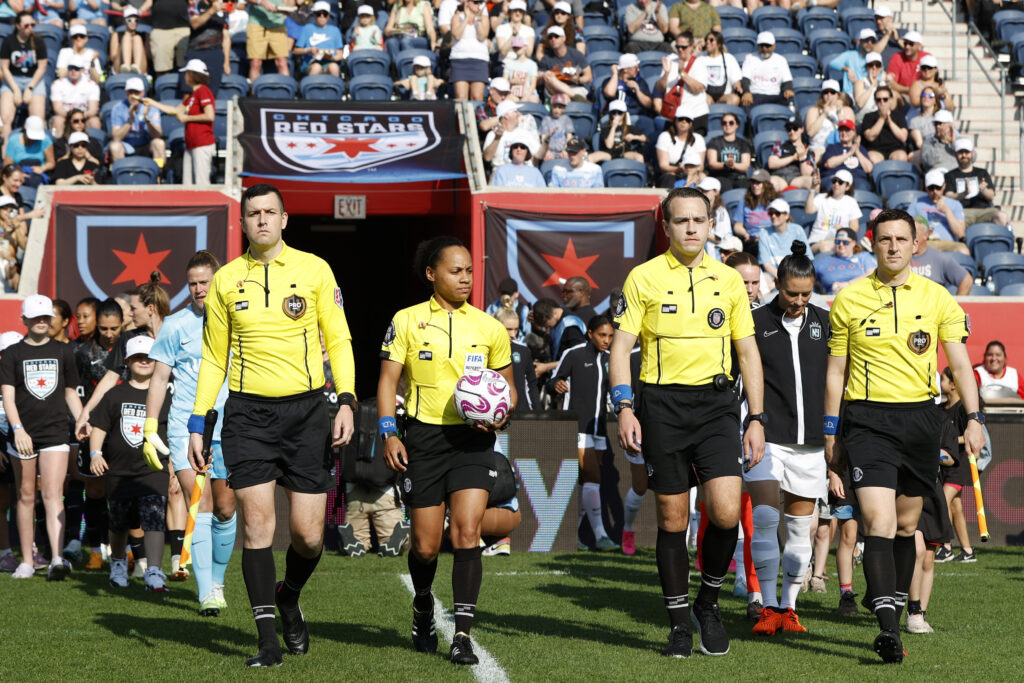 May 7, 2023; Bridgeview, Illinois, USA; The referees enter the field before the game between Chicago Red Stars and New Jersey/New York Gotham FC at SeatGeek Stadium. Mandatory Credit: Kamil Krzaczynski-USA TODAY Sports
