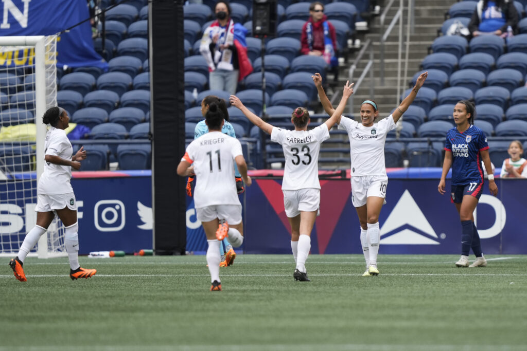 May 21, 2023; Seattle, Washington, USA; New Jersey/New York Gotham FC forward Lynn Williams (10) celebrates withNew Jersey/New York Gotham FC midfielder Olivia Van der Jagt (33) and additional teammates after scoring a goal during the first half against OL Reign at Lumen Field. Mandatory Credit: Stephen Brashear-USA TODAY Sports