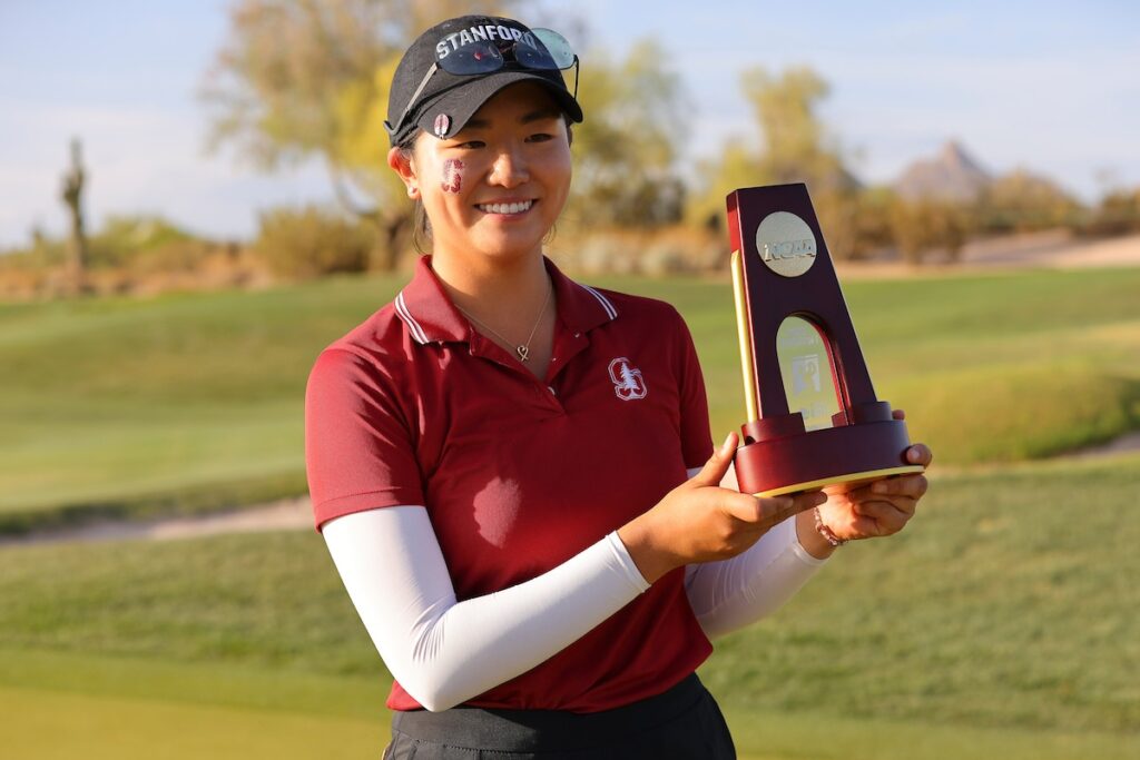 Stanford's Rose Zhang holding the 2022 NCAA Division I Individual Title trophy.