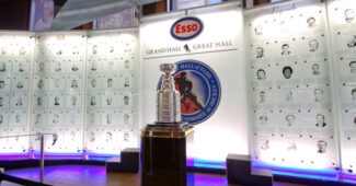 The Stanley Cup is pictured against the backdrop of the Hockey Hall of Fame.