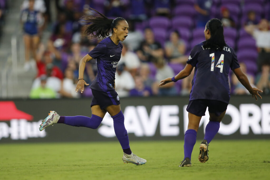 Jun 11, 2023; Orlando, Florida, USA;  Orlando Pride forward Adriana (9) celebrates her goal with midfielder Viviana Villacorta (14) during the second half against Portland Thorns FC at Exploria Stadium. Mandatory Credit: Russell Lansford-USA TODAY Sports