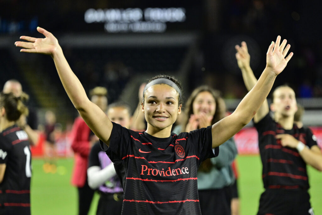 Jun 23, 2023; Portland, Oregon, USA; Portland Thorns FC forward Sophia Smith (9) celebrates defeating the Washington Spirit at Providence Park. Mandatory Credit: Troy Wayrynen-USA TODAY Sports