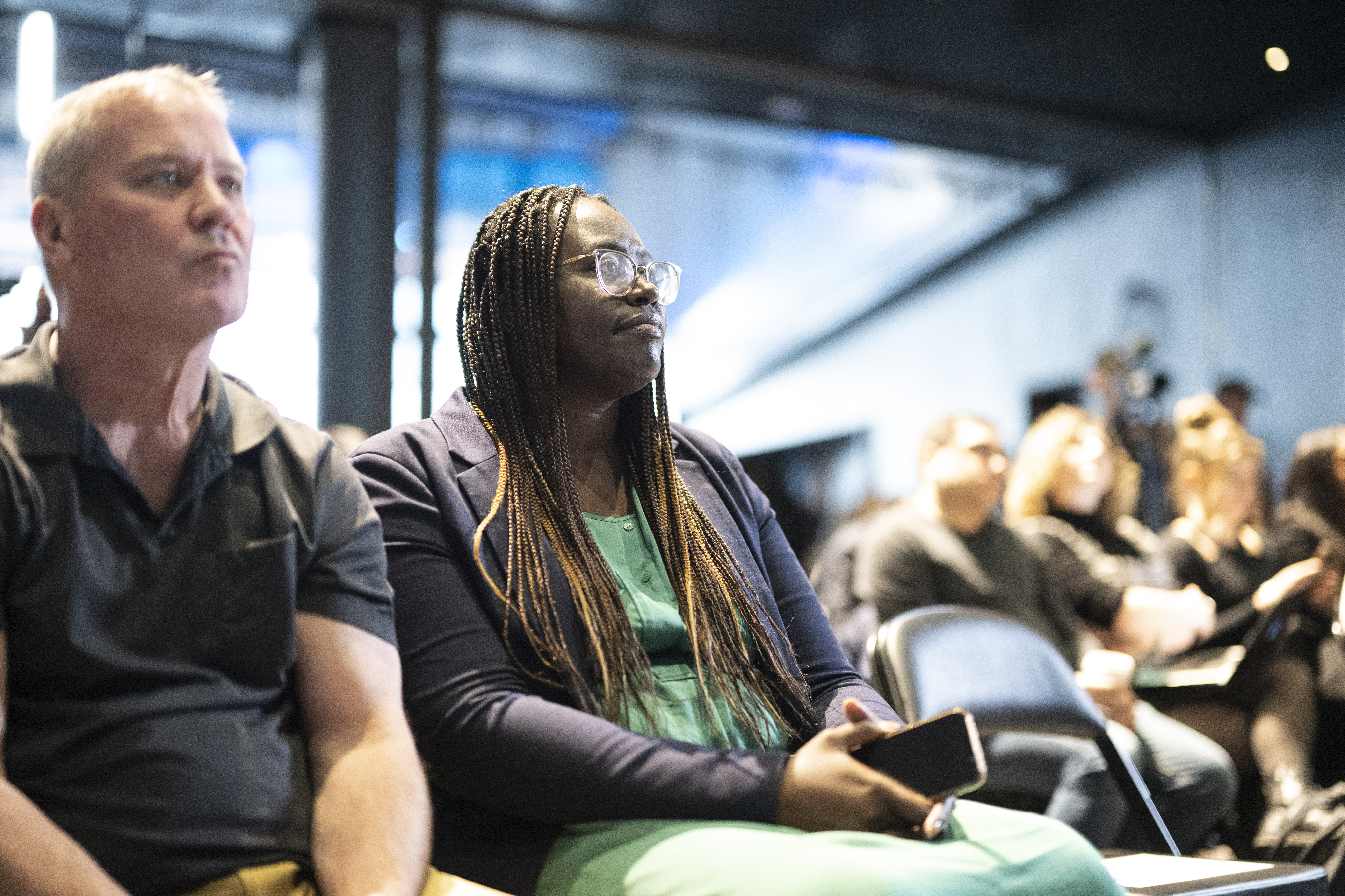 Golden State Valkyries general manager Ohemaa Nyanin sits in the audience of a press release during her time with the New York Liberty.