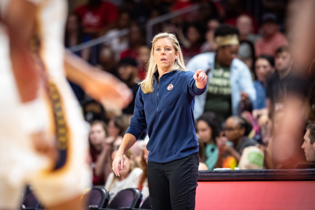 Indiana Fever head coach Christie Sides coaching against the Washington Mystics on July 7, 2023