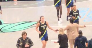 Maddy Siegrist comes off the floor during the Dallas Wings game against the New York Liberty on July 19, 2023. (Howard Megdal photo)