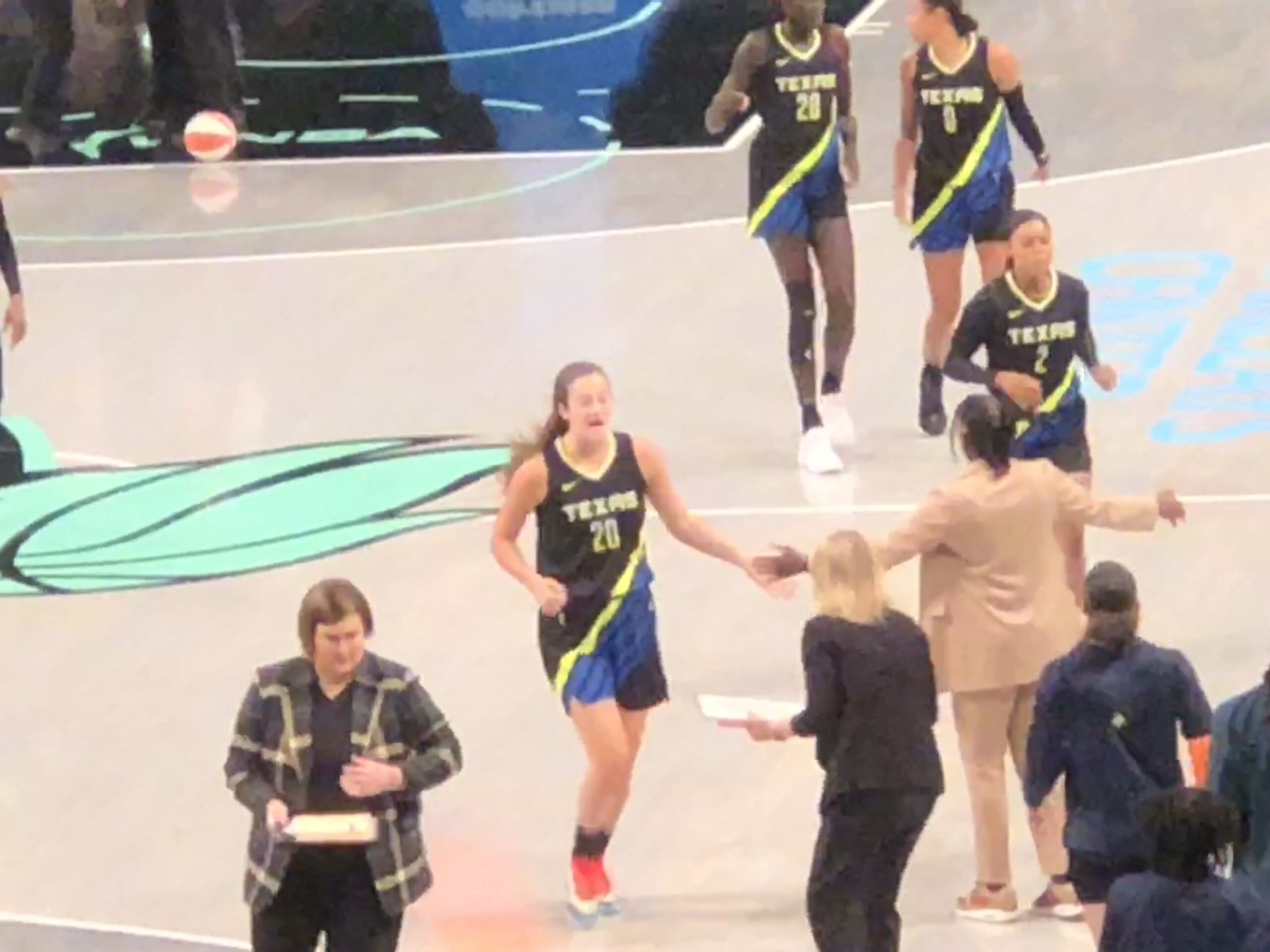 Maddy Siegrist comes off the floor during the Dallas Wings game against the New York Liberty on July 19, 2023. (Howard Megdal photo)