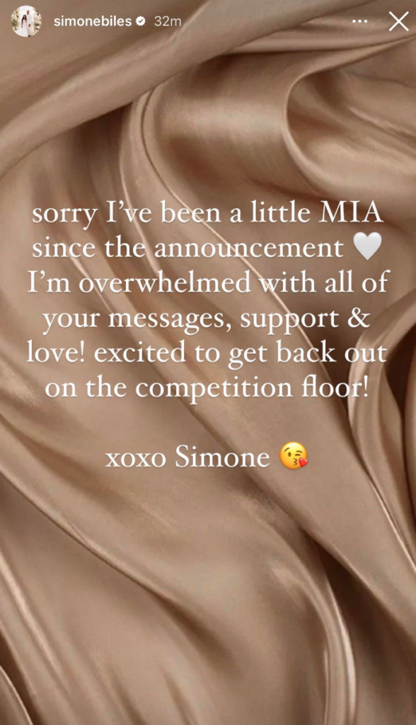 A screenshot of an Instagram story from Simone Biles with the text, "sorry I've been a little MIA since the announcement [heart emoji] I'm overwhelmed with all of your messages, support & love! excited to get back out on the competition floor! xoxo Simone [kiss emoji]"