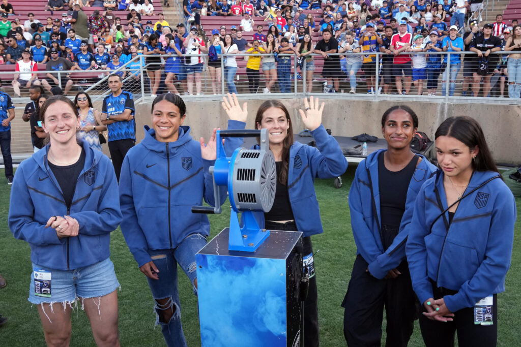 Jul 1, 2023; Stanford, California, USA; (L to R) United States women’s national team members Andi Sullivan and Alana Cook and Kelley O’Hara and Naomi Girma and Sophia Smith prepare to sound the San Jose Earthquakes siren before the game against the Los Angeles Galaxy at Stanford Stadium. Mandatory Credit: Darren Yamashita-USA TODAY Sports