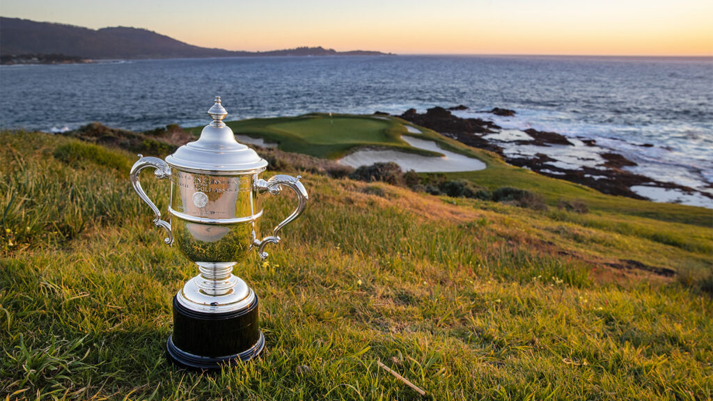 The U.S. Women’s Open Trophy with the 7th green in the background at Pebble Beach Golf Links in Pebble Beach, Calif. on Thursday, Feb. 17, 2022.  (Copyright USGA/Kip Evans)