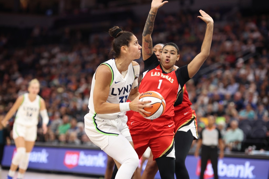 Kierstan Bell guards Minnesota's Nikolina Milic in the Aces' July 22nd game in Minneapolis. 
