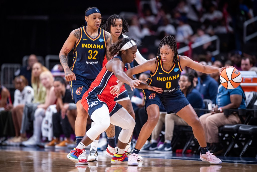 Washington Mystics guard Linnae Harper tightly defends Indiana Fever guard <a rel=