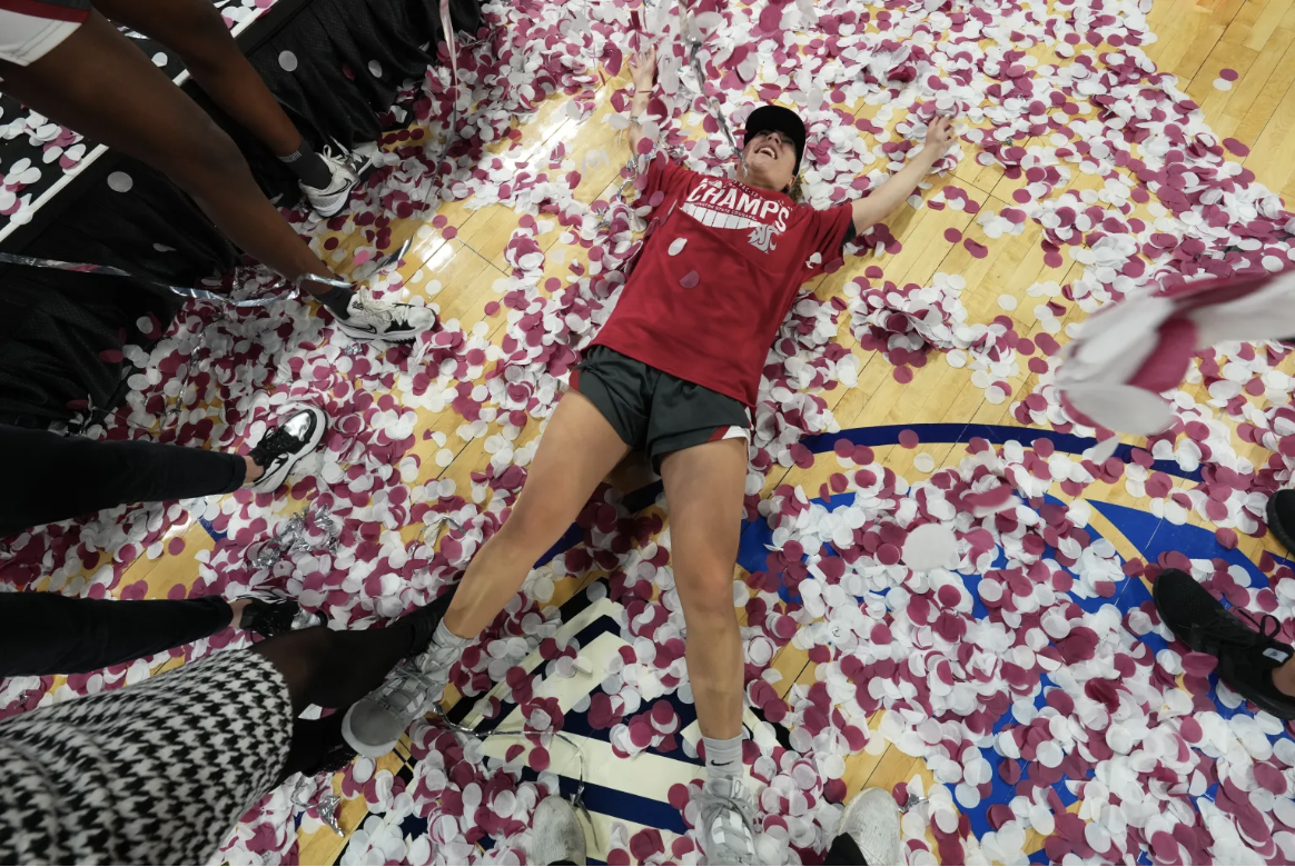 Charlisse Leger-Walker celebrates the teams Pac-12 championship. Photo Credit: Power Imagery