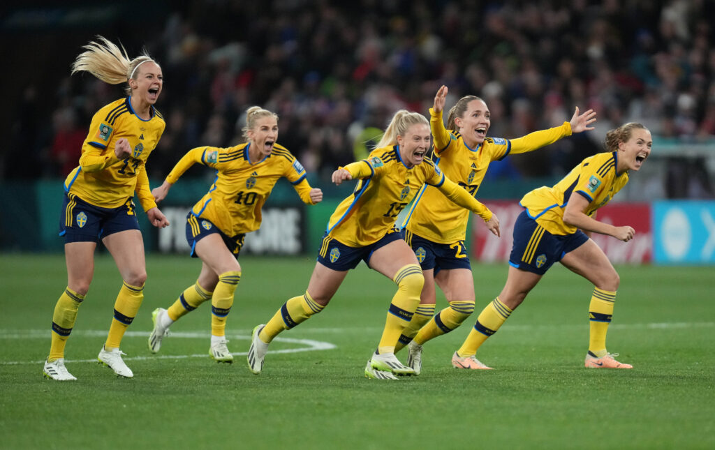 Aug 6, 2023; Melbourne, AUS; Sweden players celebrate the winning goal by forward Lina Hurtig (not pictured) against the United States in the penalty kick shootout during a Round of 16 match in the 2023 FIFA Women's World Cup at Melbourne Rectangular Stadium. Mandatory Credit: Jenna Watson-USA TODAY Sports