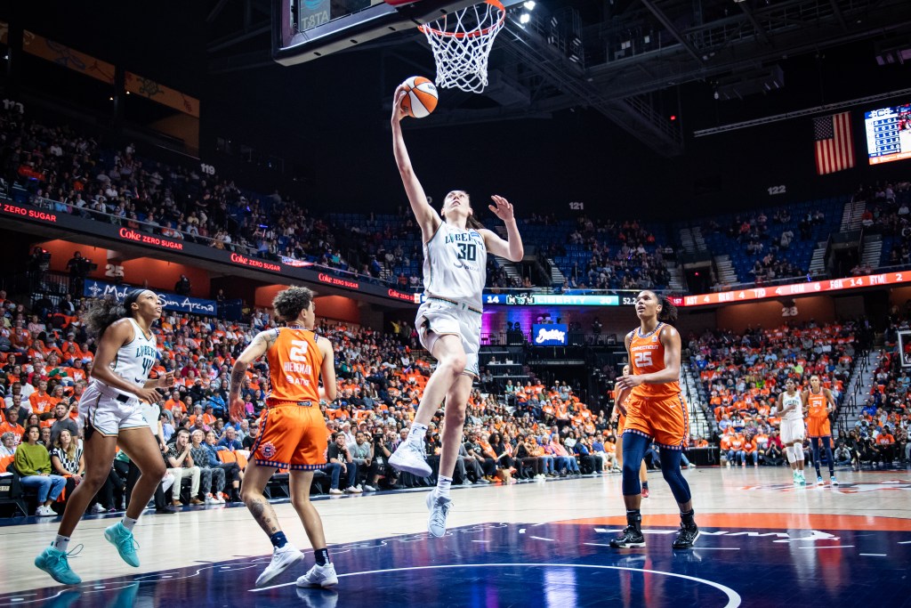 Breanna Stewart drives to the basket and makes an open right-handed layup in transition.