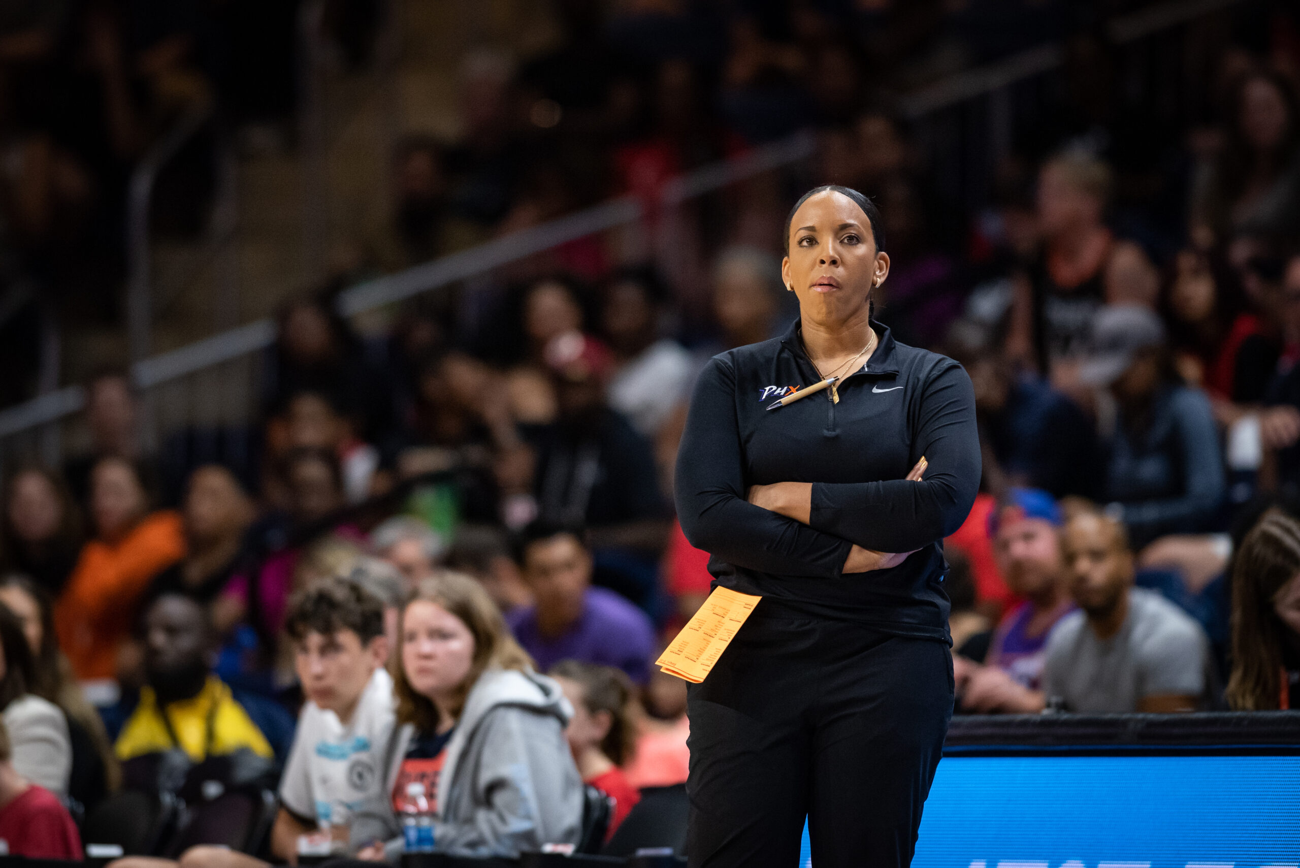 Nikki Blue coaches during a Phoenix Mercury at Washington Mystics game on July 23, 2023.