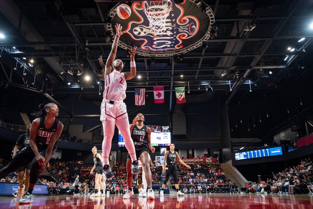 Washington Mystics forward Myisha Hines-Allen shoots an uncontested right-handed layup.
