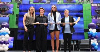 Jayna Hefford, Billy Jean Kind, Taylor Heise and Natalie Darwitz stand on stage at the PWHL draft.