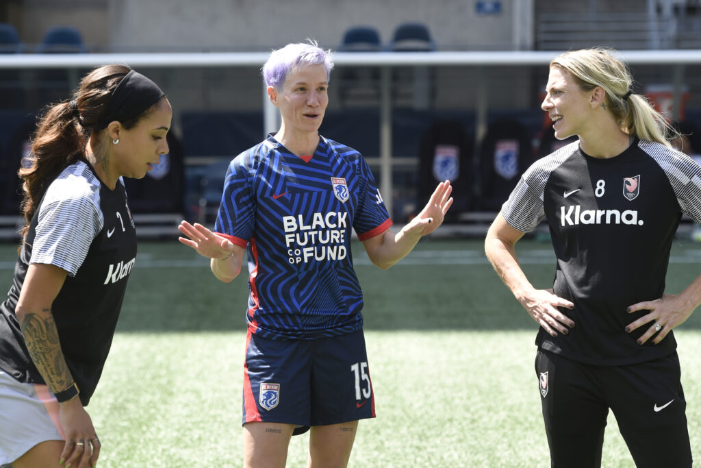 May 27, 2023; Seattle, Washington, USA; OL Reign forward Megan Rapinoe (15) speaks with Angel City FC forward Sydney Leroux (2) and defender Julie Ertz (8) following the match at Lumen Field. Mandatory Credit: Michael Thomas Shroyer-USA TODAY Sports