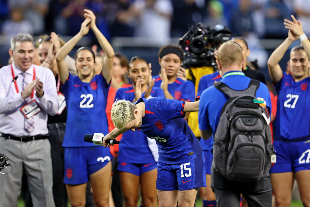 Sep 24, 2023; Chicago, Illinois, USA; United States forward Megan Rapinoe (15) bows after the game against South Africa in her last national team appearance at Soldier Field. Mandatory Credit: Jon Durr-USA TODAY Sports