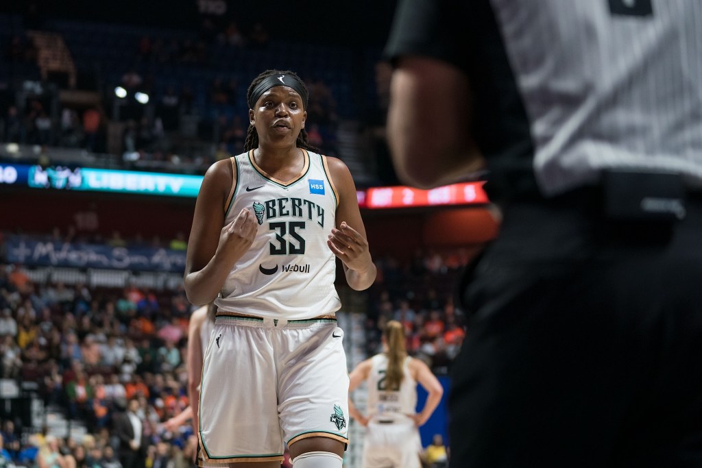 New York Liberty forward Jonquel Jones has something to say to an official.