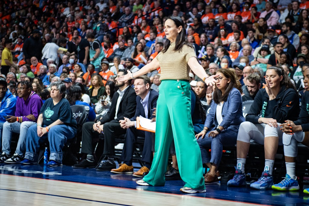 Sandy Brondello is shocked by something.