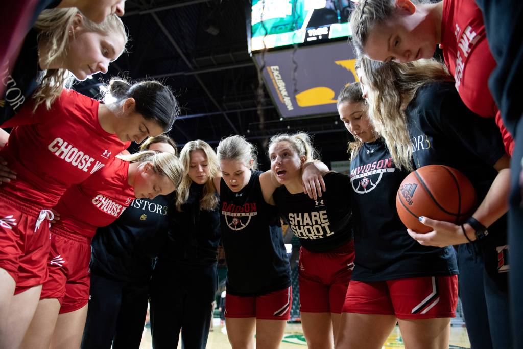 Davidson women's basketball huddles up before taking on Mason on Jan. 28, 2023.