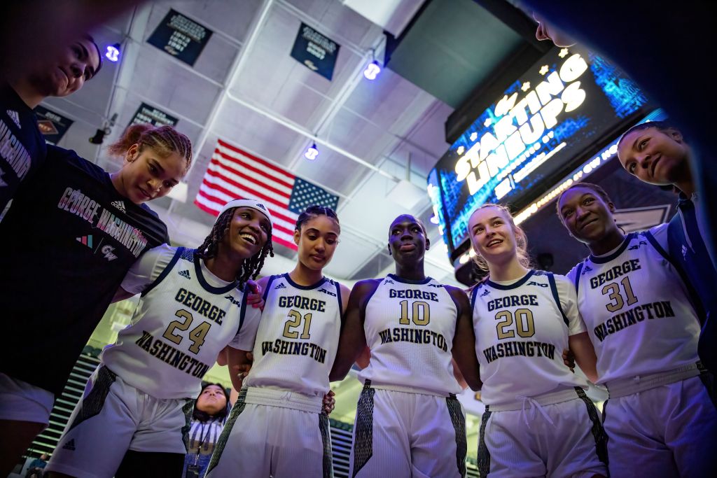 George Washington huddles up before the team played Loyola Chicago
