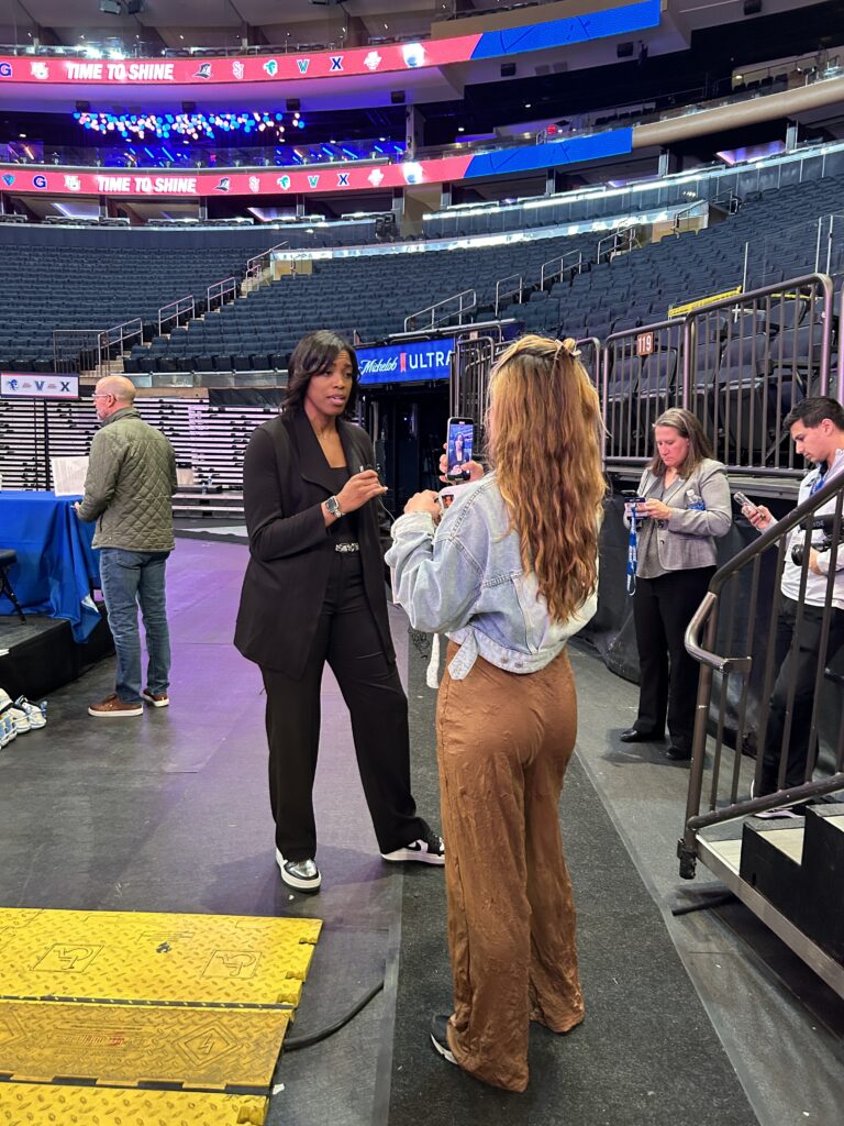 The Next's Gigi Speer interviews Providence head coach Erin Batth during BIG EAST Media Day on Oct. 24, 2023. (Howard Megdal photo)