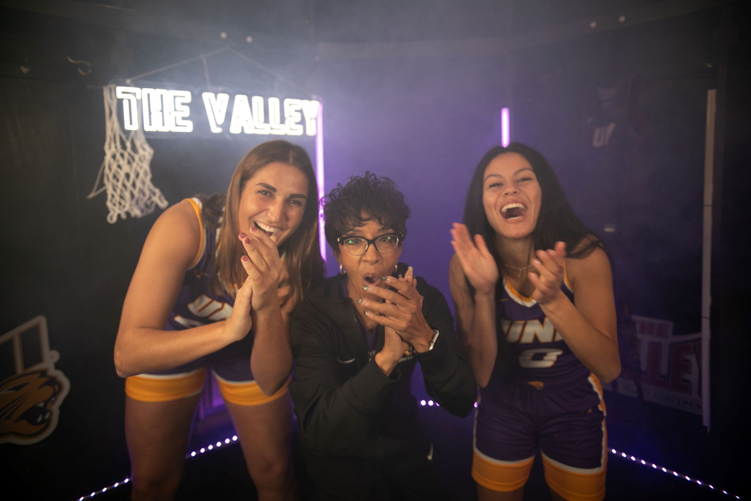 UNI Head Coach Tanya Warren and MVC Preseason Player of the Year Grace Boffeli (left) and Maya McDermott.