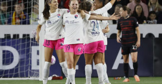 San Diego Wave FC forward Kyra Carusa (19) celebrates her goal against the Portland Thorns FC with forward Alex Morgan (13) at Providence Park.