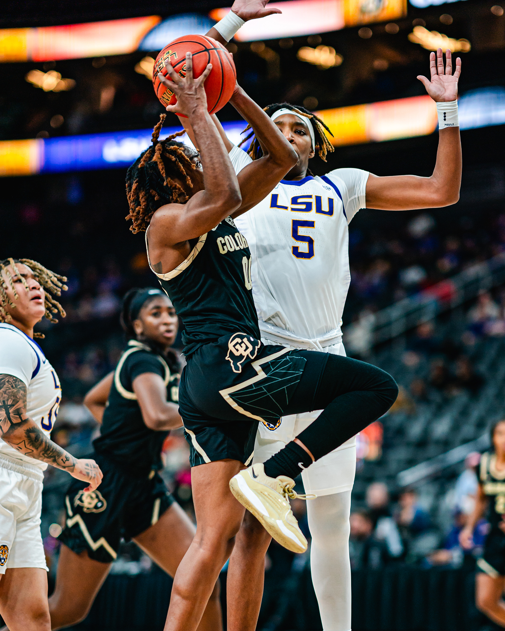 Colorado fifth-year senior guard Jaylyn Sherrod goes to the basket against LSU on November 6.