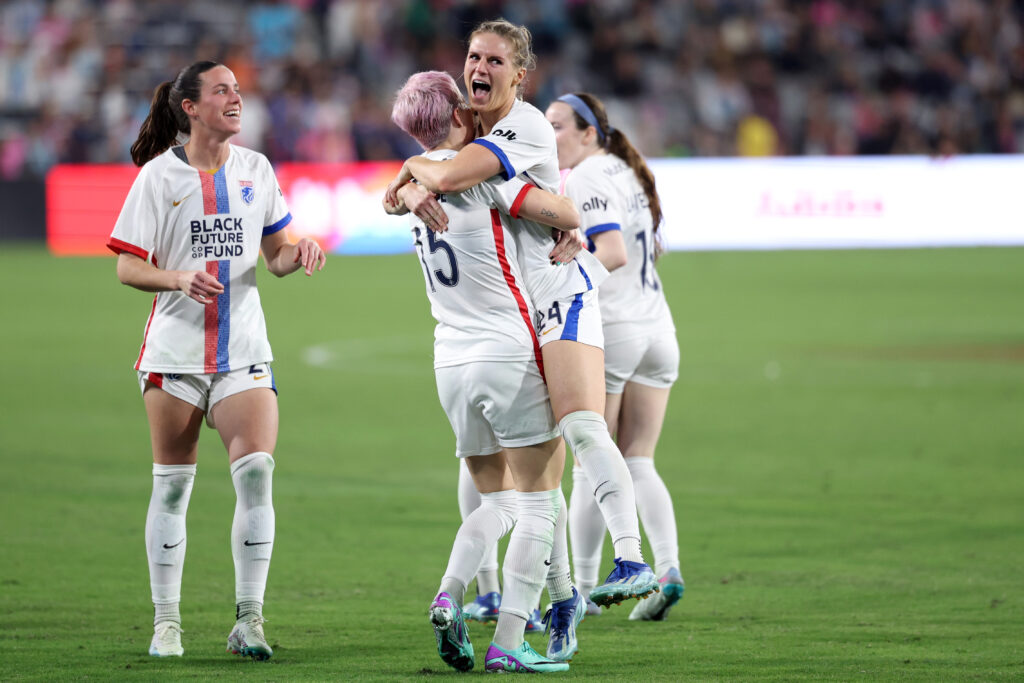 Nov 5, 2023; San Diego, California, USA;  OL Reign forward Veronica Latsko (24) celebrates after scoring with forward Megan Rapinoe (15) in the second half against the San Diego Wave FC during the National Womens Soccer League Semifinal between San Diego Wave and OL Reign at Snapdragon Stadium. Mandatory Credit: Kiyoshi Mio-USA TODAY Sports