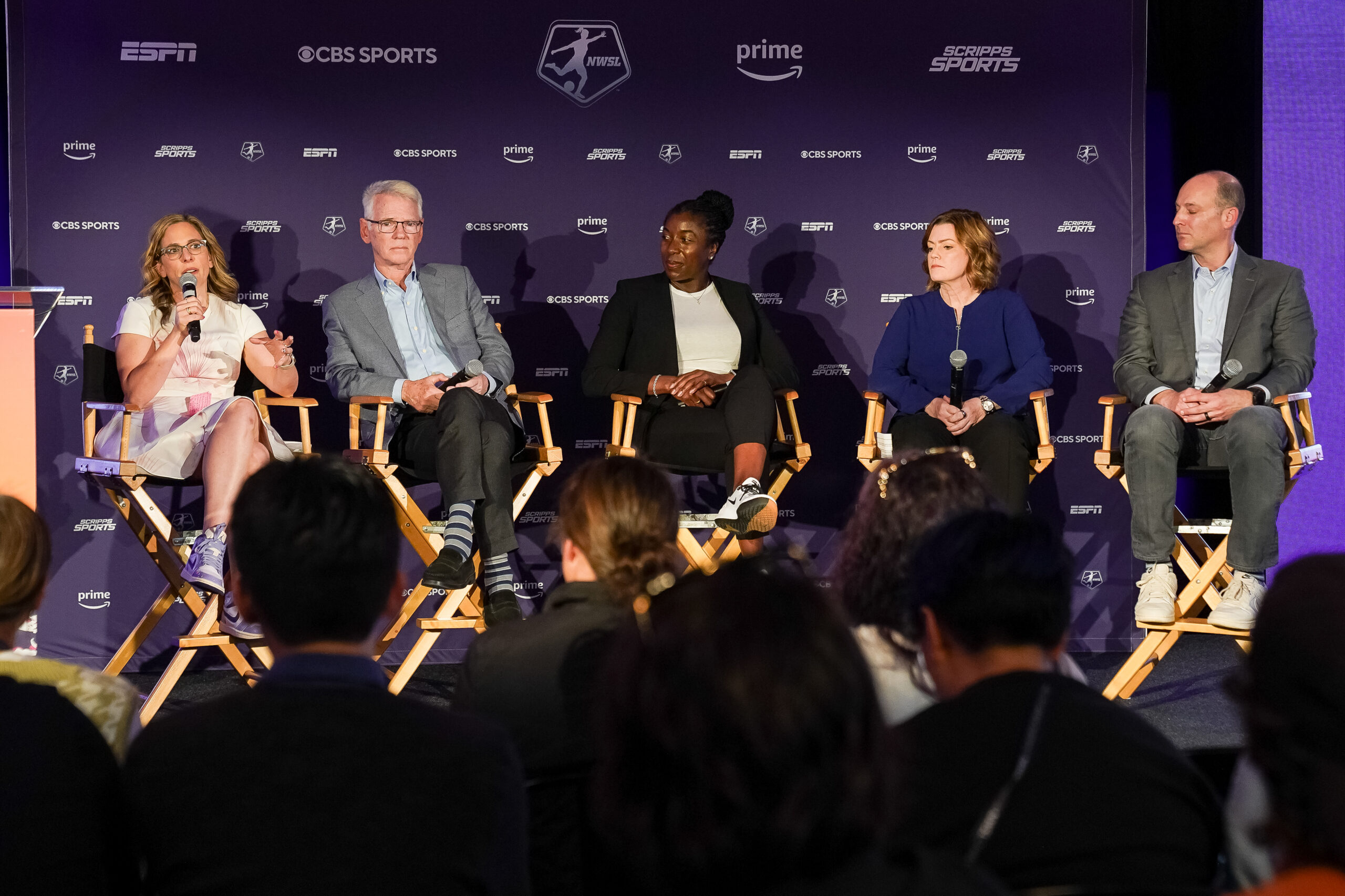 Nov 9, 2023; San Diego, California, USA; From left, NWSL commissioner Jessica Berman, CBS Sports chairman Sean McManus, ESPN executive vice president Rosalyn Durant, Amazon vice president Marie Donoghue and E.W. Scripps Company CEO Adam Symson on stage during a press conference announcing the NWSL’s new media partnerships with CBS Sports, ESPN, Prime Video, and Scripps Sports at Venue 808. Kyle Terada-USA TODAY Sports