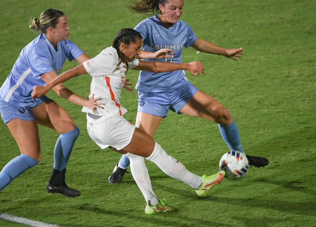 Clemson defender Makenna Morris brings the ball up field near Columbia's Courtney Ruedt during the first half of action at Historic Riggs Field in Clemson, S.C. Friday, November 17, 2023.