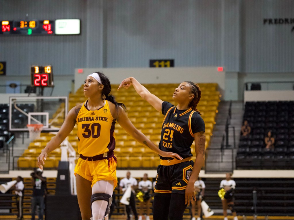 De’Mya Young of Grambling State looks on and points at an Arizona State player