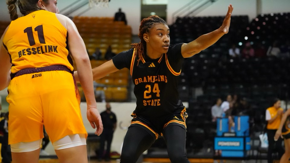 Demya Young playing defense for the Tigers in the win over Grambling State.