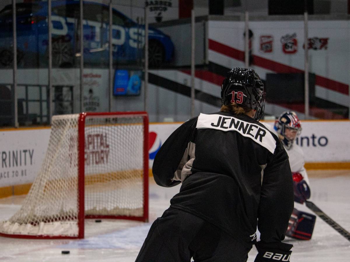 Brianne Jenner skates away from the camera at a practice.