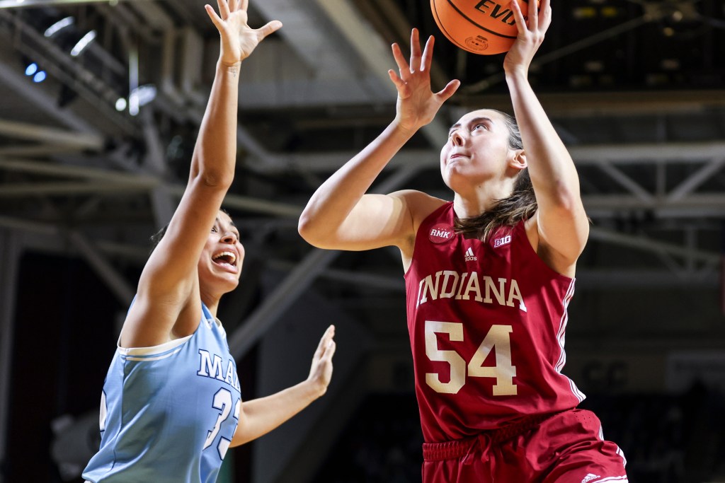 Mackenzie Holmes attempts a layup against Maine on Nov. 30.