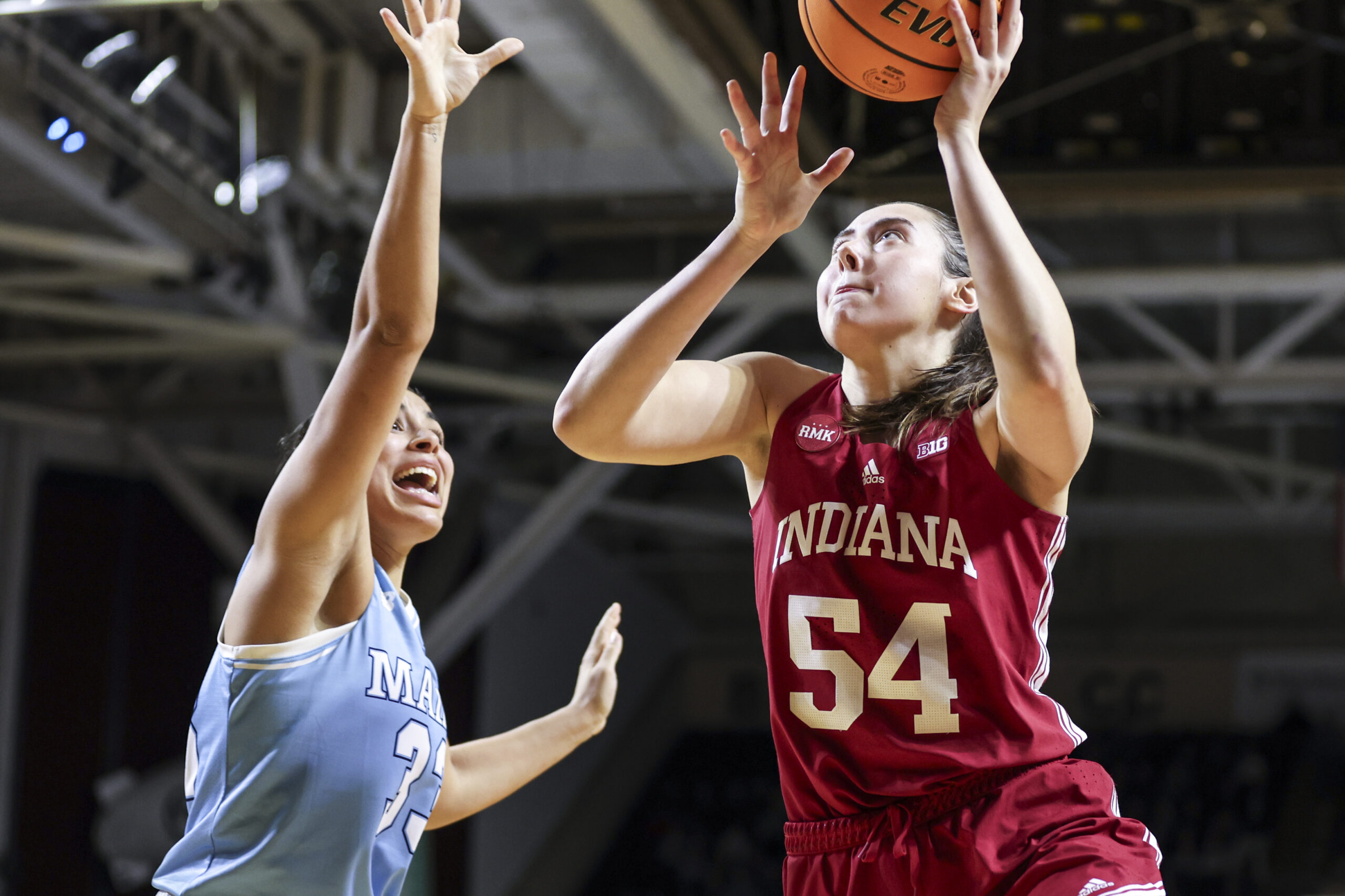 Mackenzie Holmes attempts a layup against Maine on Nov. 30.