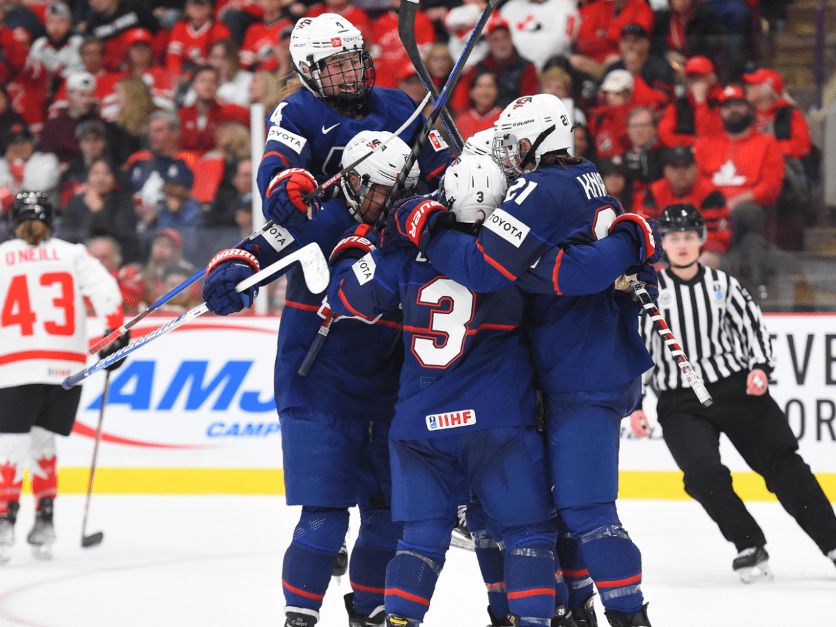 Team USA celebrates a goal against Team Canada