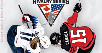 Two hockey players (one in a white, USA #11 jersey an another in a red, Canada #15 jersey face off for a puck drop. They are pictured against a backdrop that includes the Rivalry Series logo, containing flags for both countries.